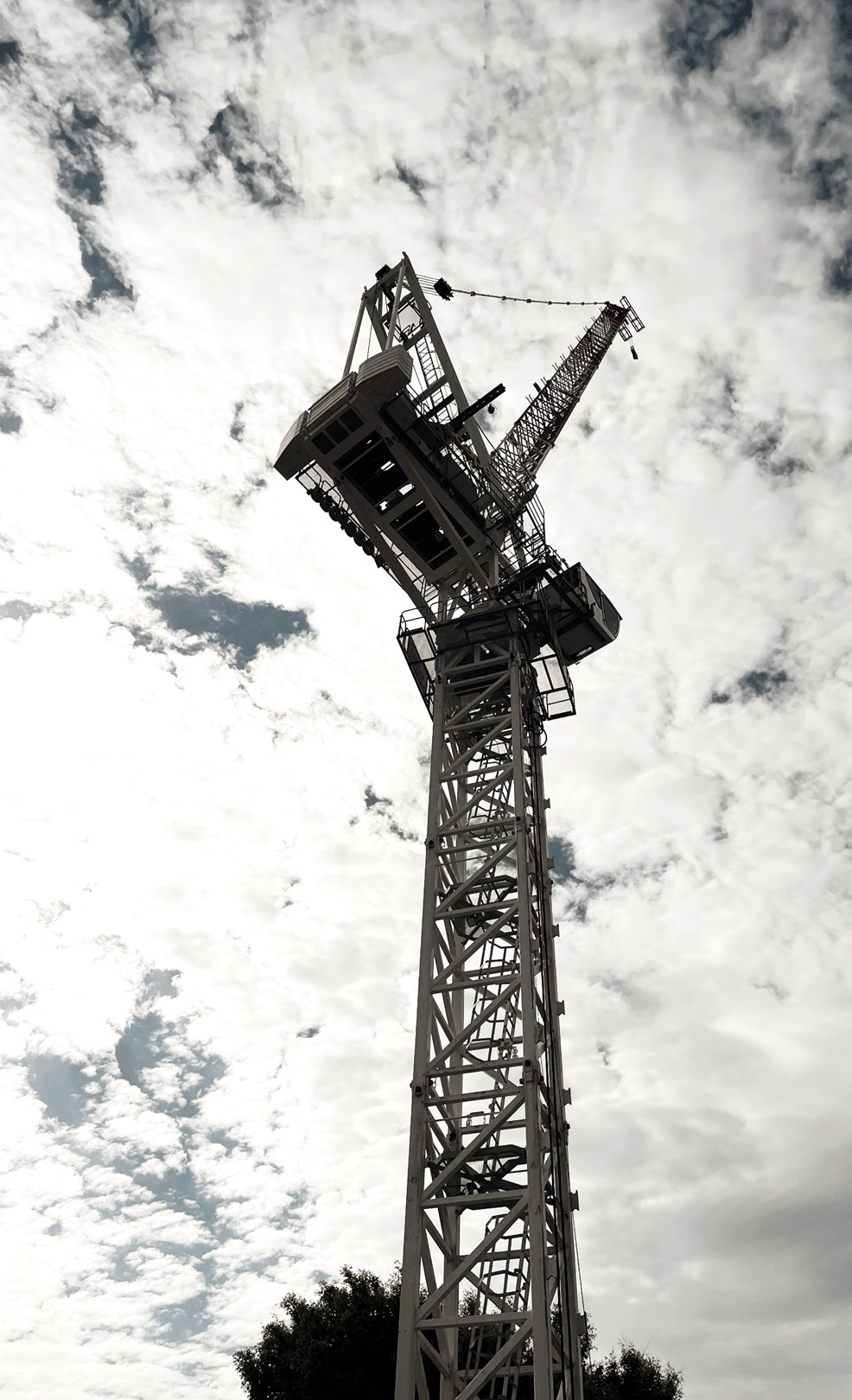 A crane in a blue sky backdrop